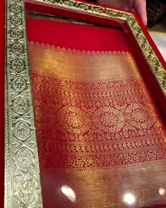 Red Kanjivaram Silk Saree with Rich Gold Zari Border.