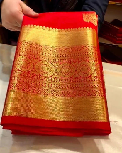 Red Kanjivaram Silk Saree with Rich Gold Zari Border.