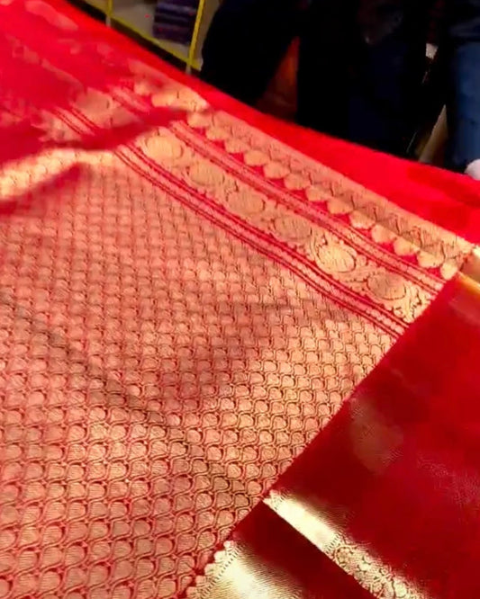Red Kanjivaram Silk Saree with Rich Gold Zari Border.